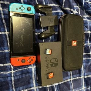 Nintendo switch with case and 3 games